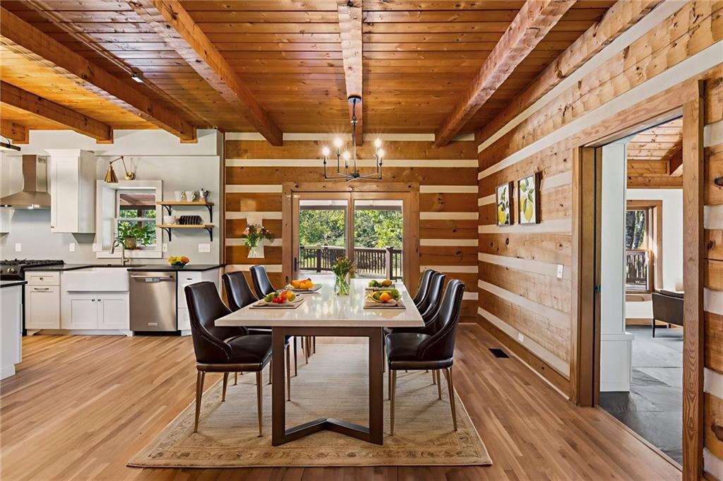 2905 Cammie Wages Road Dacula, GA 30019 - Photo 7 of 55 a view of a dining room with furniture window and wooden floor