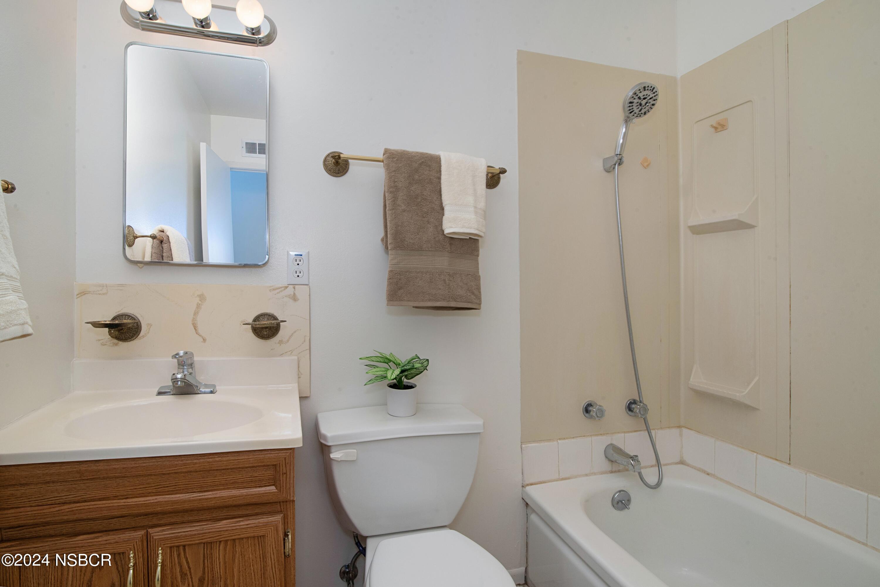 3380 Via Elba Lompoc, CA 93436 - Photo 13 of 23 a bathroom with a sink toilet and shower