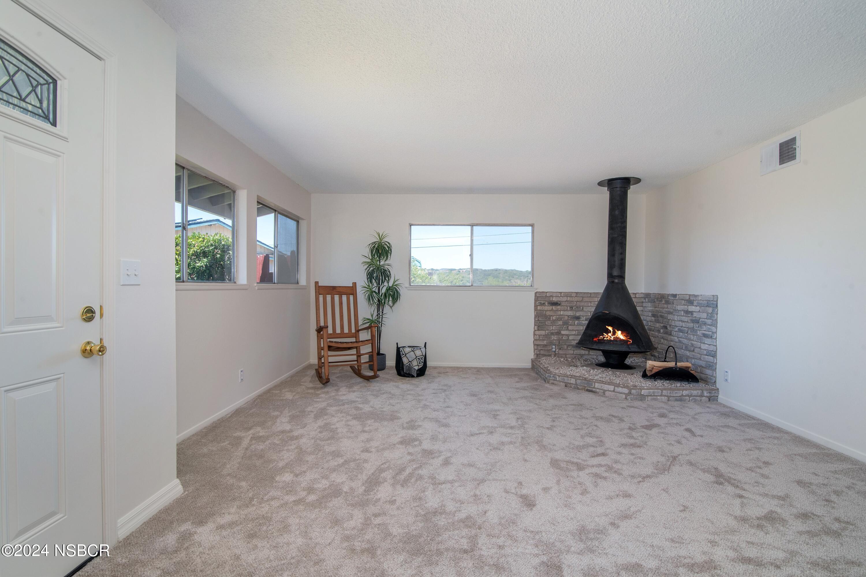 3380 Via Elba Lompoc, CA 93436 - Photo 2 of 23 a view of a room with furniture and windows