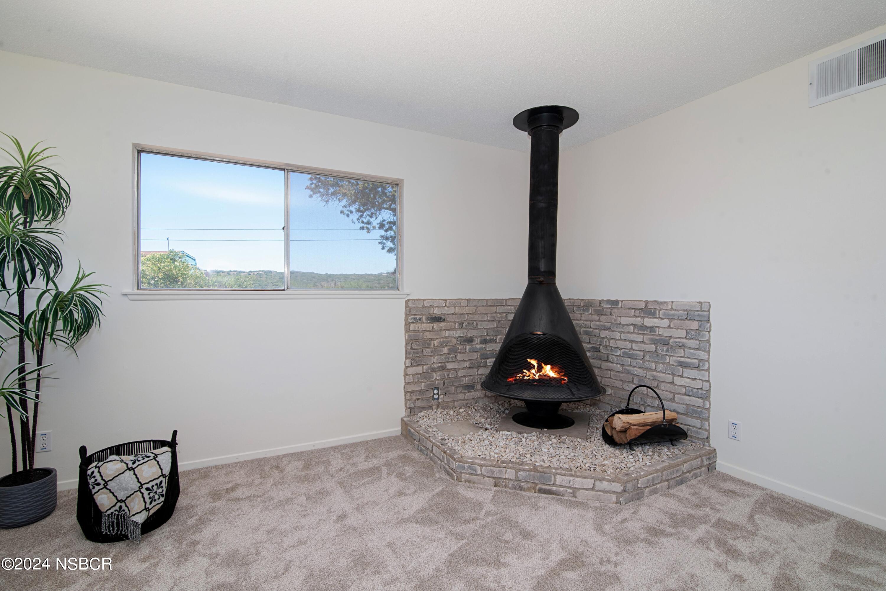 3380 Via Elba Lompoc, CA 93436 - Photo 3 of 23 a kitchen with a refrigerator and a hard wood floor