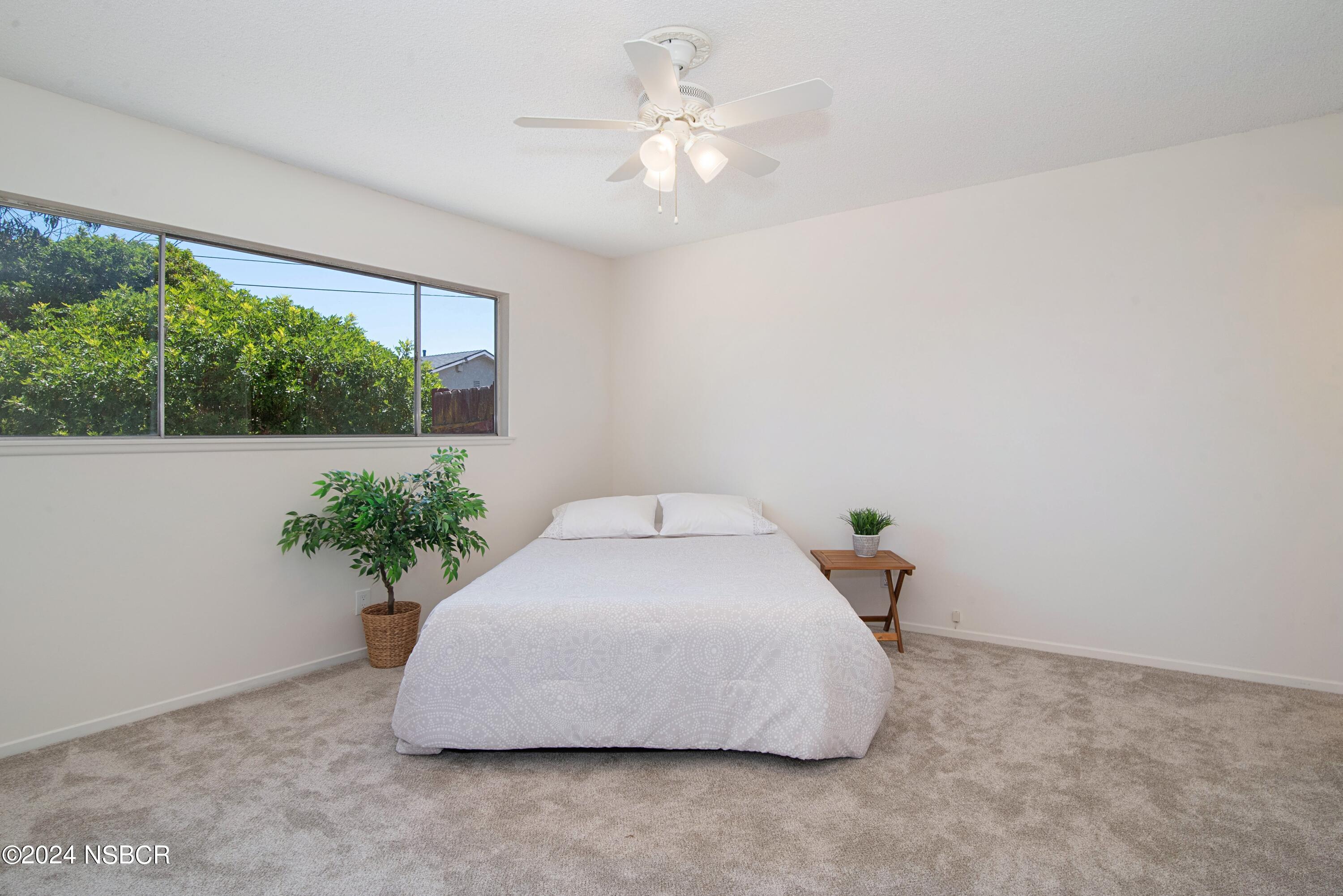 3380 Via Elba Lompoc, CA 93436 - Photo 8 of 23 a bed sitting in a room next to a window