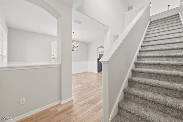 a view of a swimming pool with a backyard