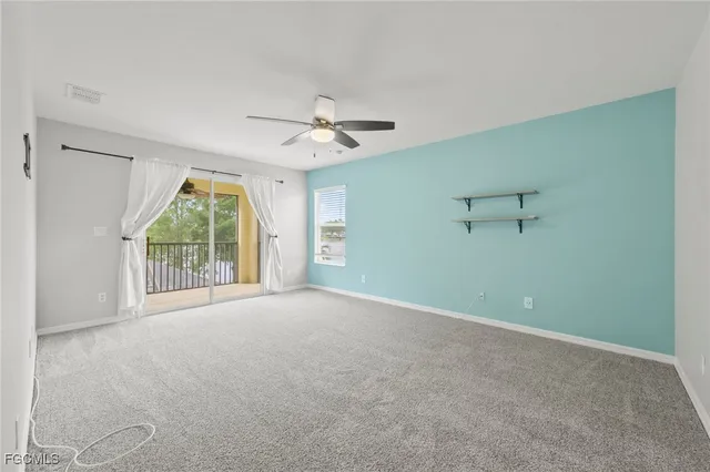 a view of a house with backyard and garden