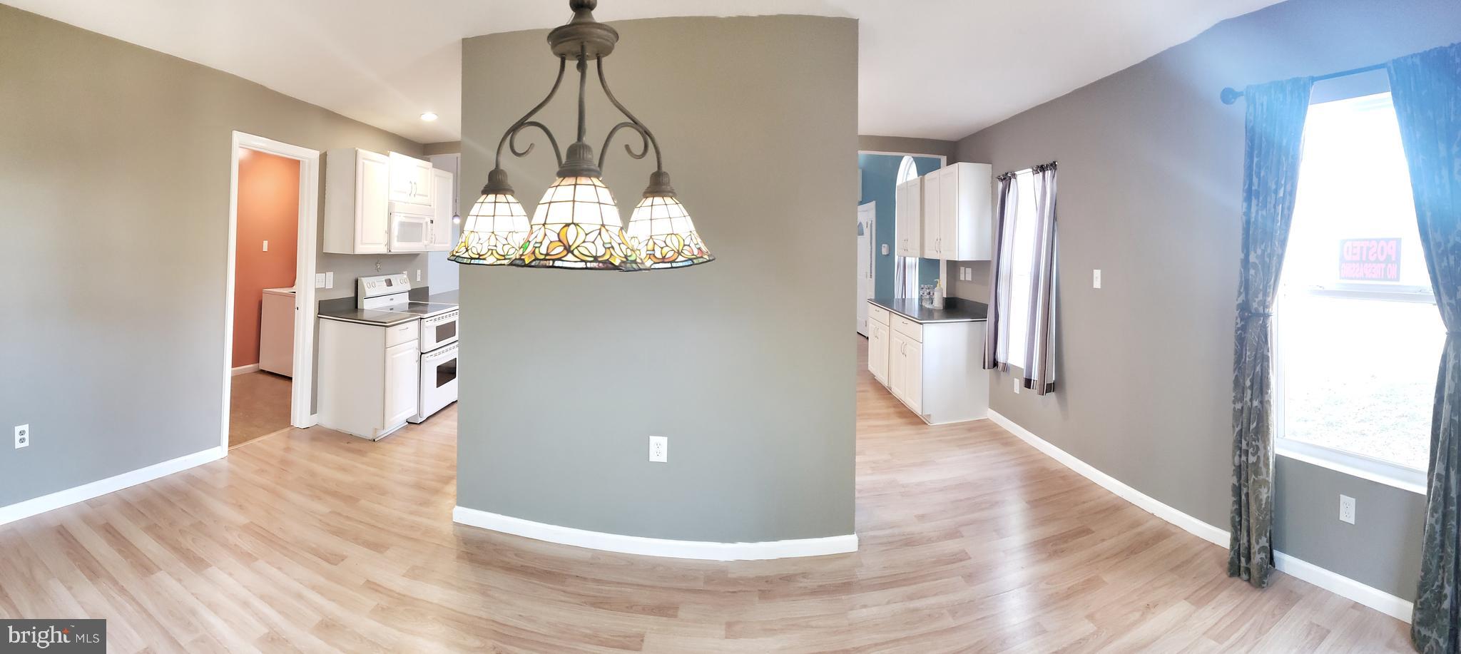 6051 Massey Crossing Road Willards, MD 21874 - Photo 22 of 60 Dining Room Adjoins the Kitchen