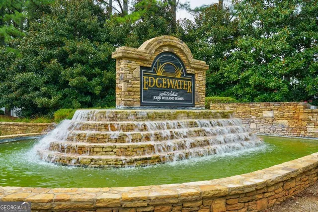 a view of swimming pool with a garden