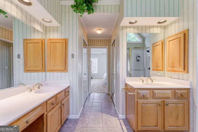 a view of a house with a big yard and sitting area