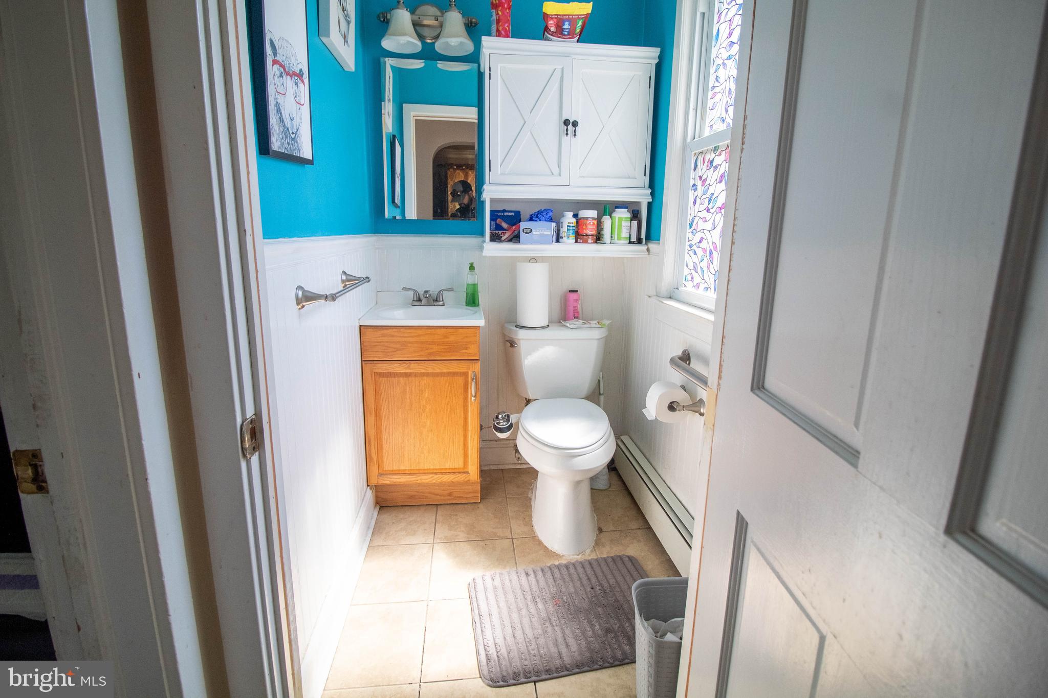 100 Grant Street Riverside, NJ 08075 - Photo 20 of 34 a bathroom with a toilet and a sink