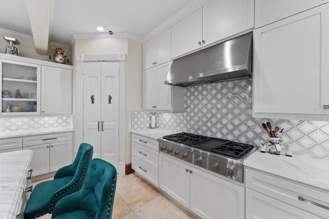 a kitchen with a sink stove and refrigerator