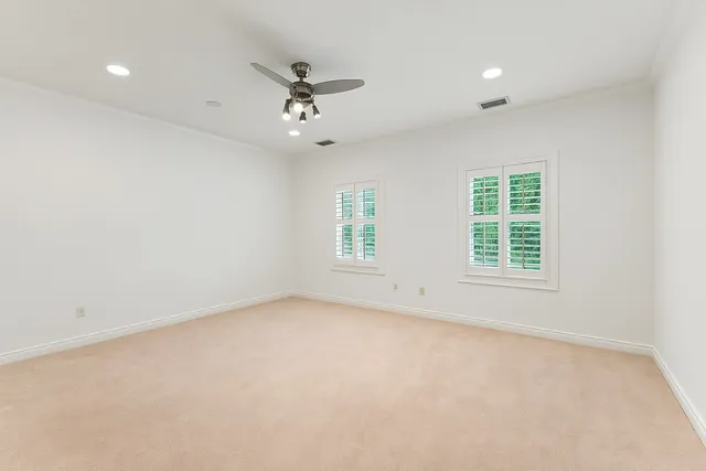 a bathroom with a granite countertop sink mirror toilet and bathtub
