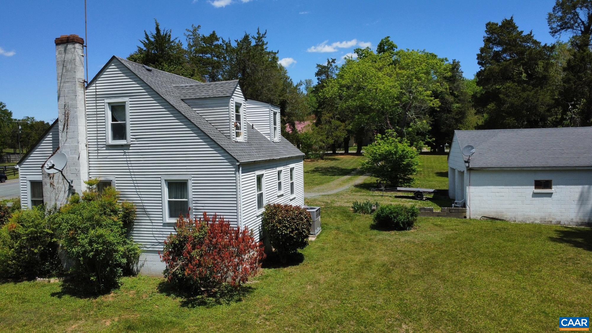 5441 Gordonsville Road Keswick, VA 22947 - Photo 6 of 6 a house view with a garden space