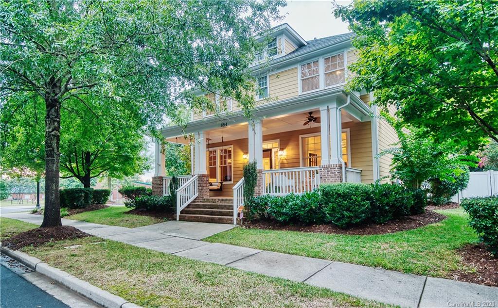 894 Promenade Walk Fort Mill, SC 29708 - Photo 1 of 45 a front view of a house with porch