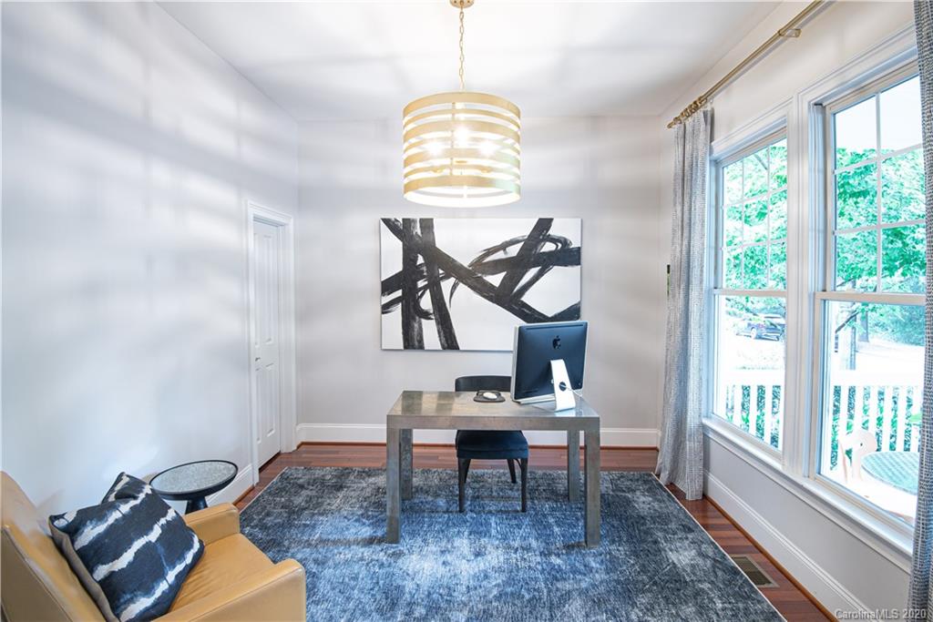 894 Promenade Walk Fort Mill, SC 29708 - Photo 5 of 45 a view of a workspace room with furniture and a window