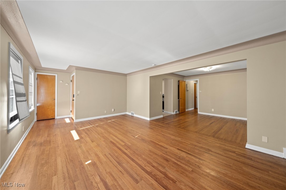 13517 Cedar Road Cleveland, OH 44118 - Photo 26 of 30 Unfurnished living room featuring light wood-type flooring
