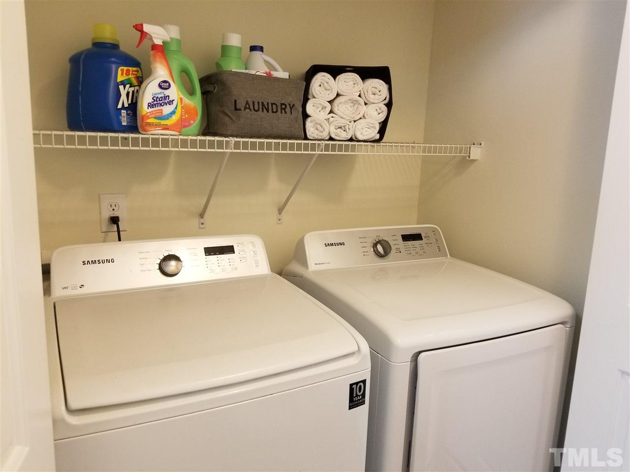 5832 Ricker Road Raleigh, NC 27610 - Photo 7 of 14 a utility room with dryer and washer