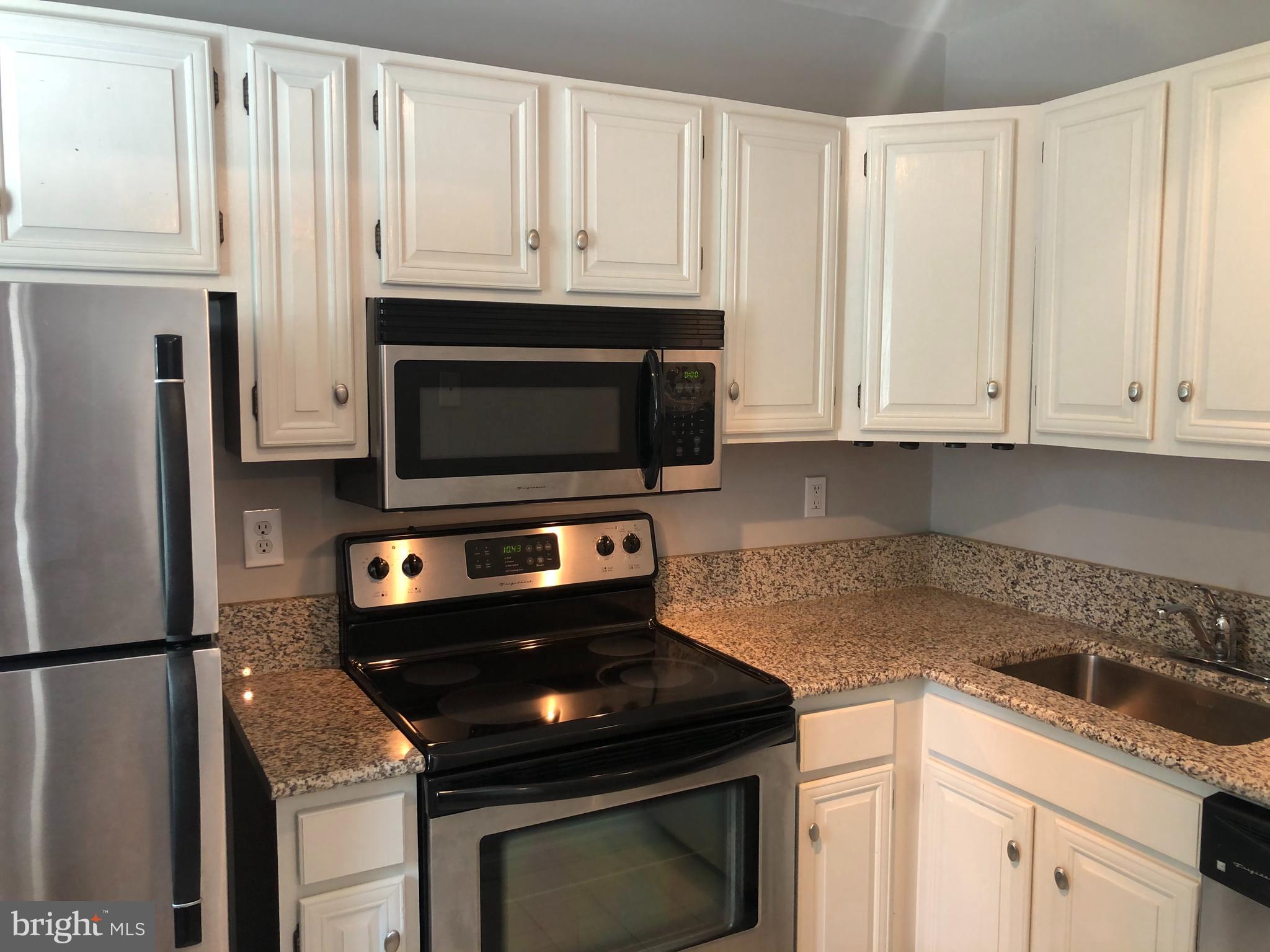 2001 16th Street Northwest, Unit 204 Washington, DC 20009 - Photo 8 of 23 Kitchen w/ Stainless Streel Applicances