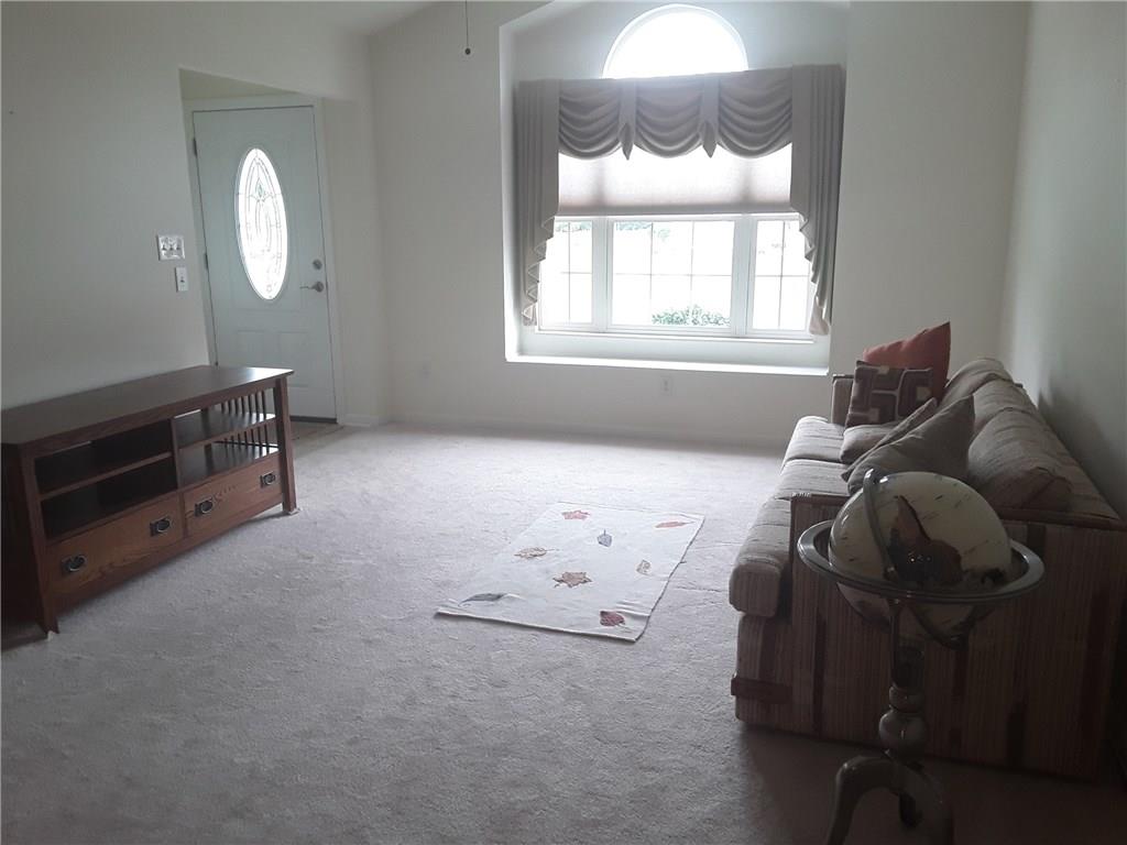 142 Rana Lane Gibsonia, PA 15044 - Photo 4 of 13 Bright and light living room with window seat.