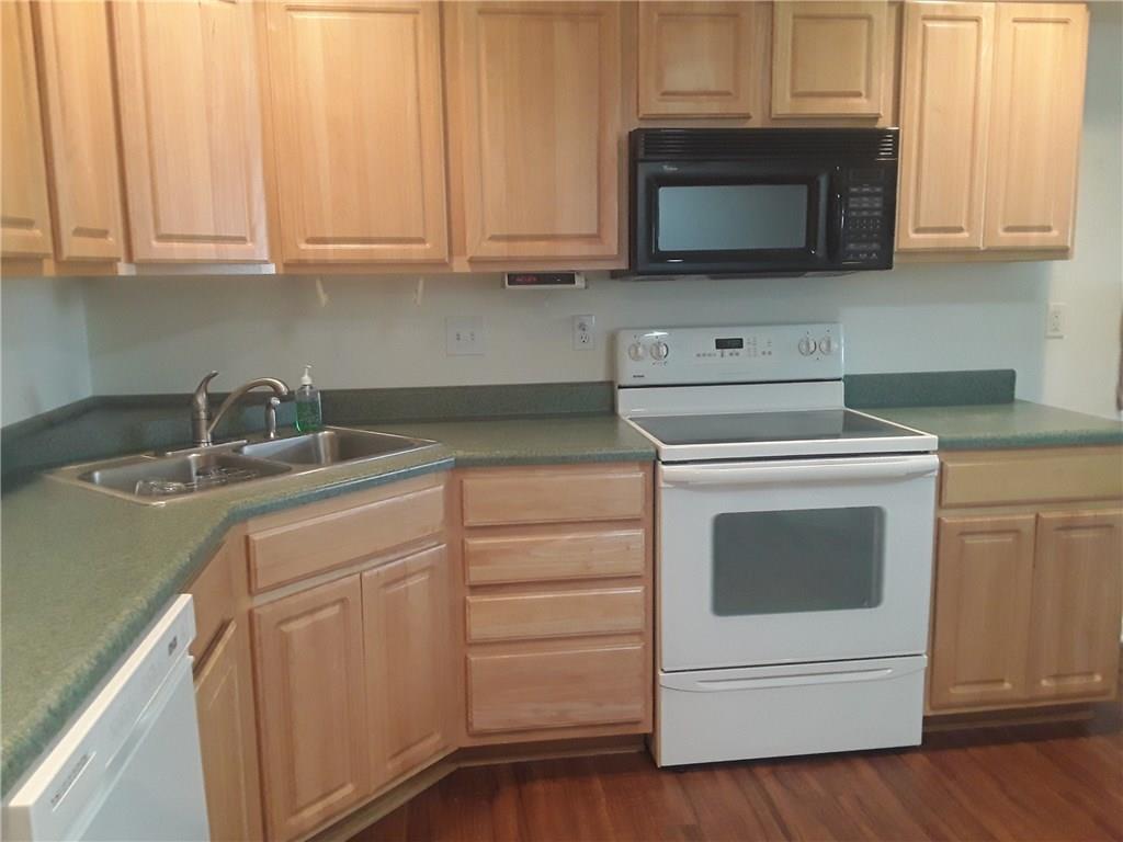 142 Rana Lane Gibsonia, PA 15044 - Photo 10 of 13 Bright and lighted kitchen due to extra solar light in ceiling.