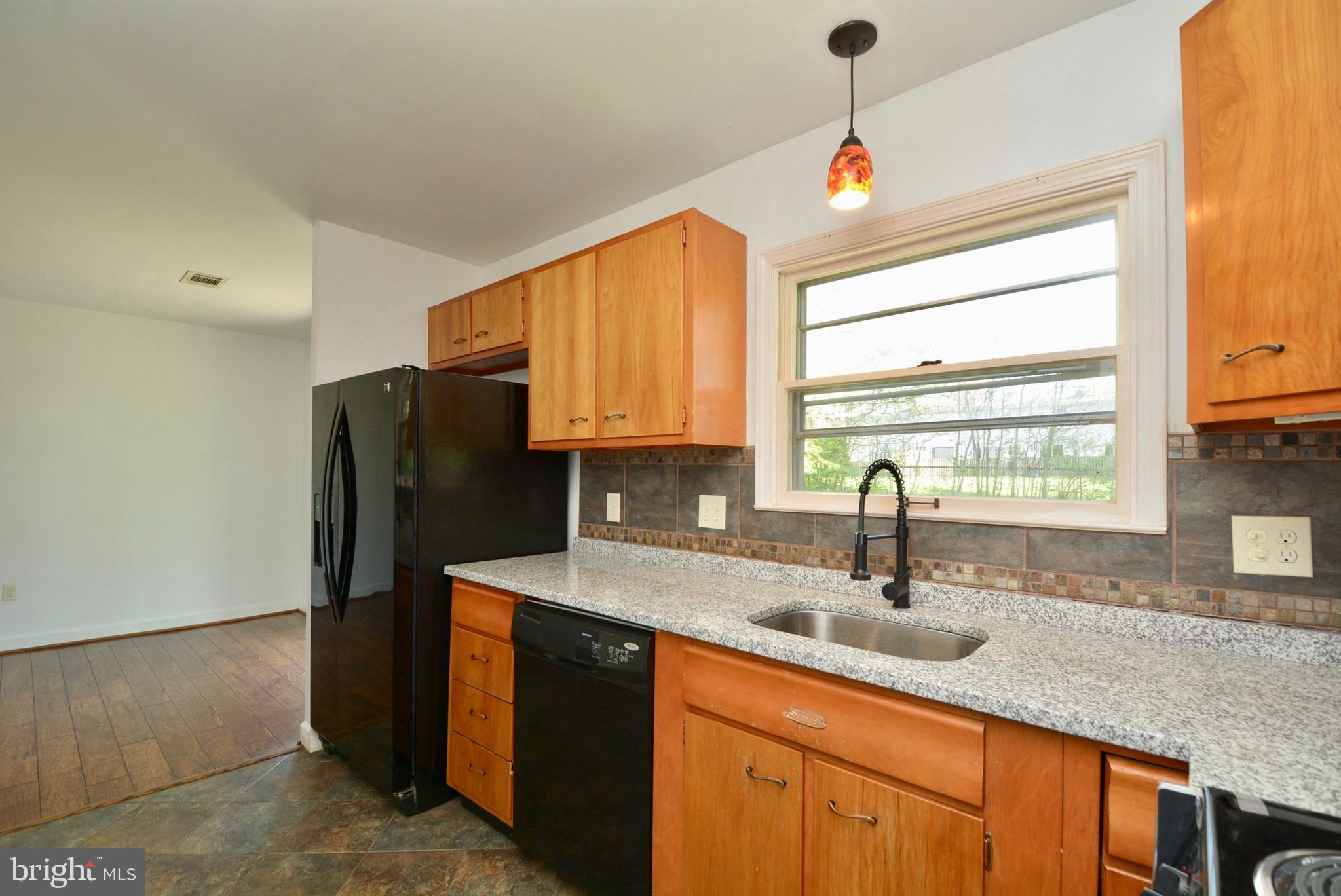 405 East Poplar Road Sterling, VA 20164 - Photo 13 of 30 Spacious kitchen w/new granite counters