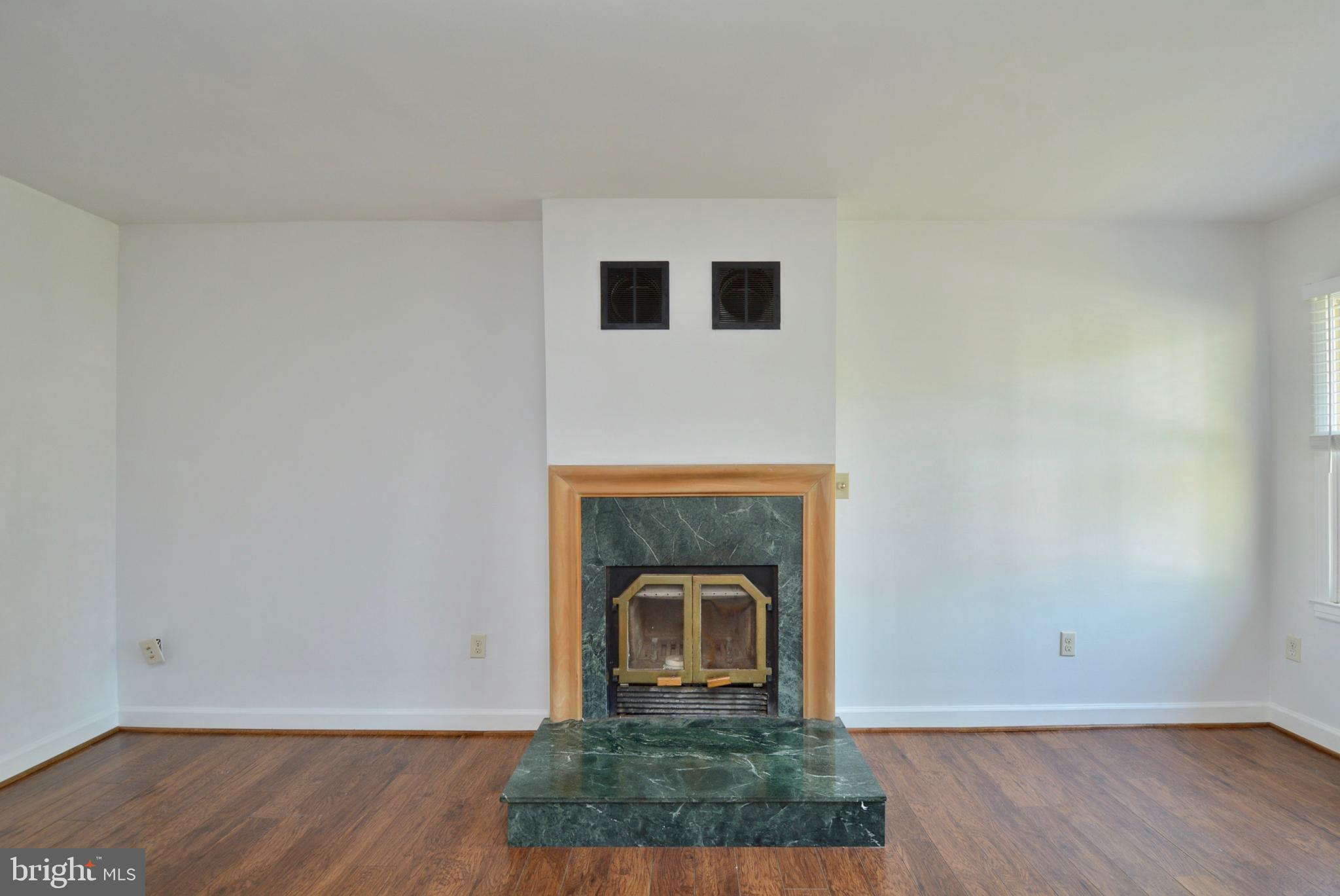 Marble wood burning fireplace