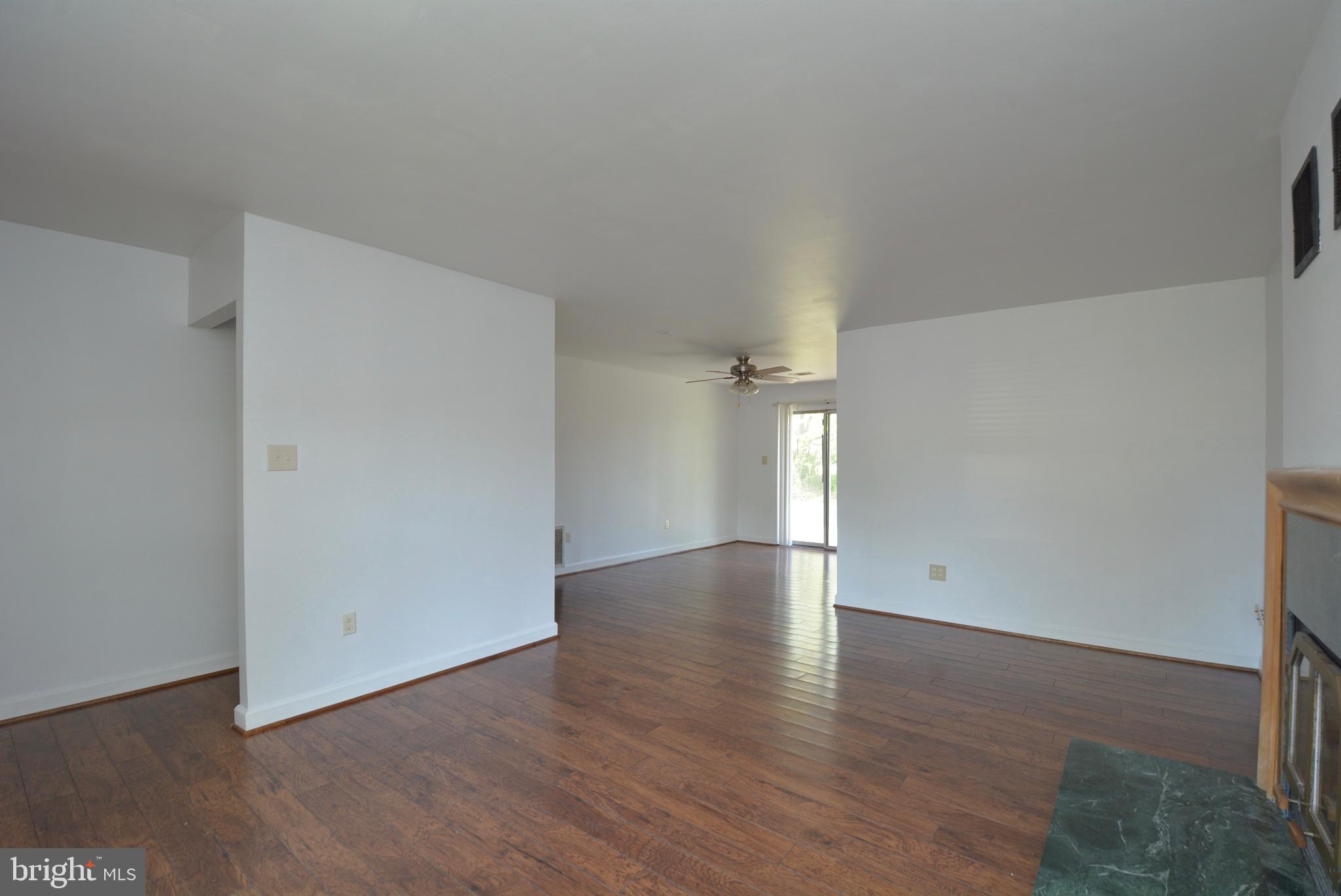 Living room into dining room - hardwood laminate