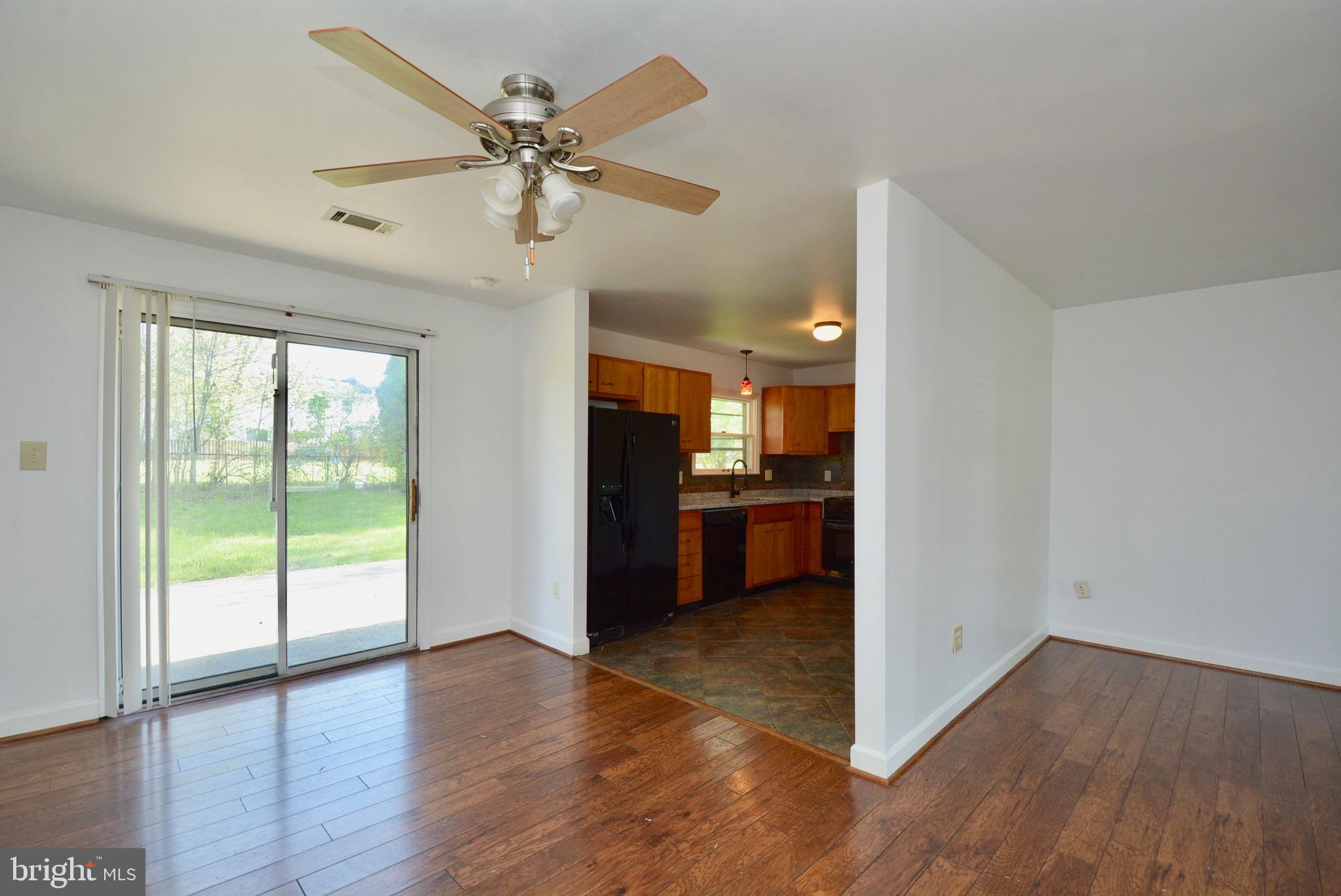 405 East Poplar Road Sterling, VA 20164 - Photo 10 of 30 Dining room view into kitchen