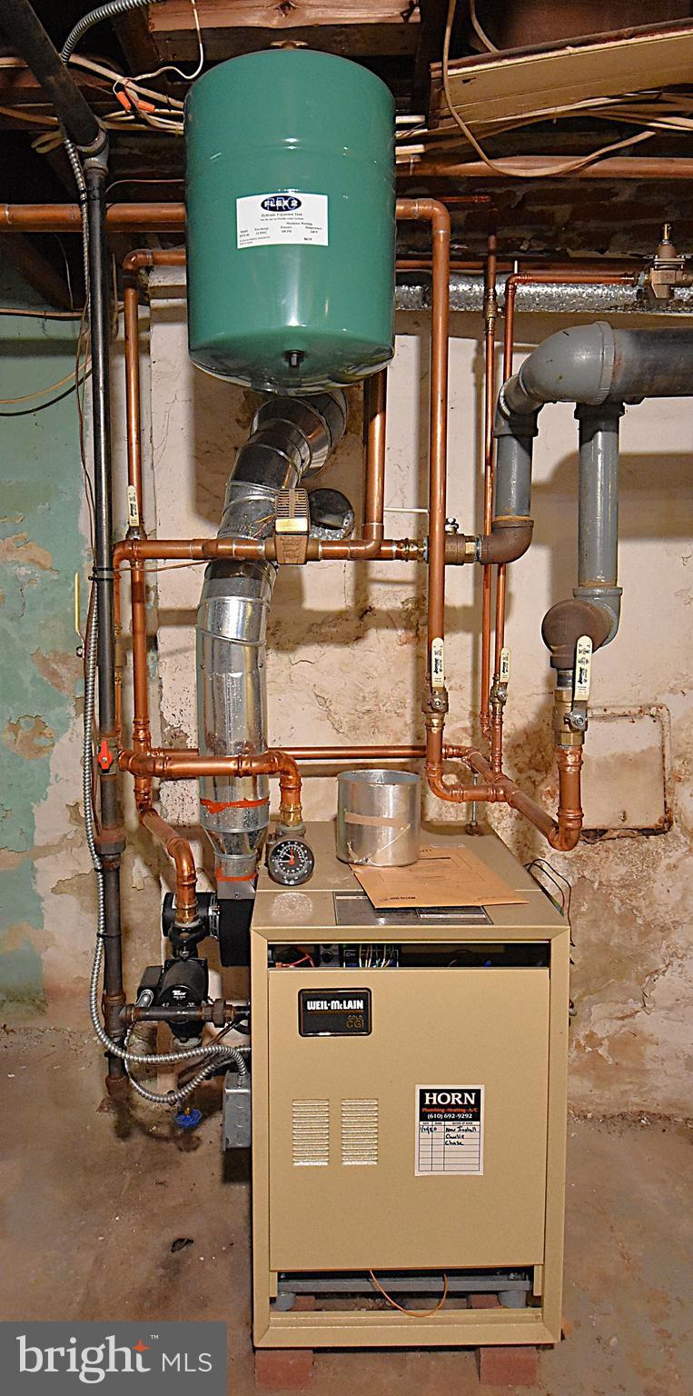 19 Farm Road Wayne, PA 19087 - Photo 36 of 41 a close view of water heater