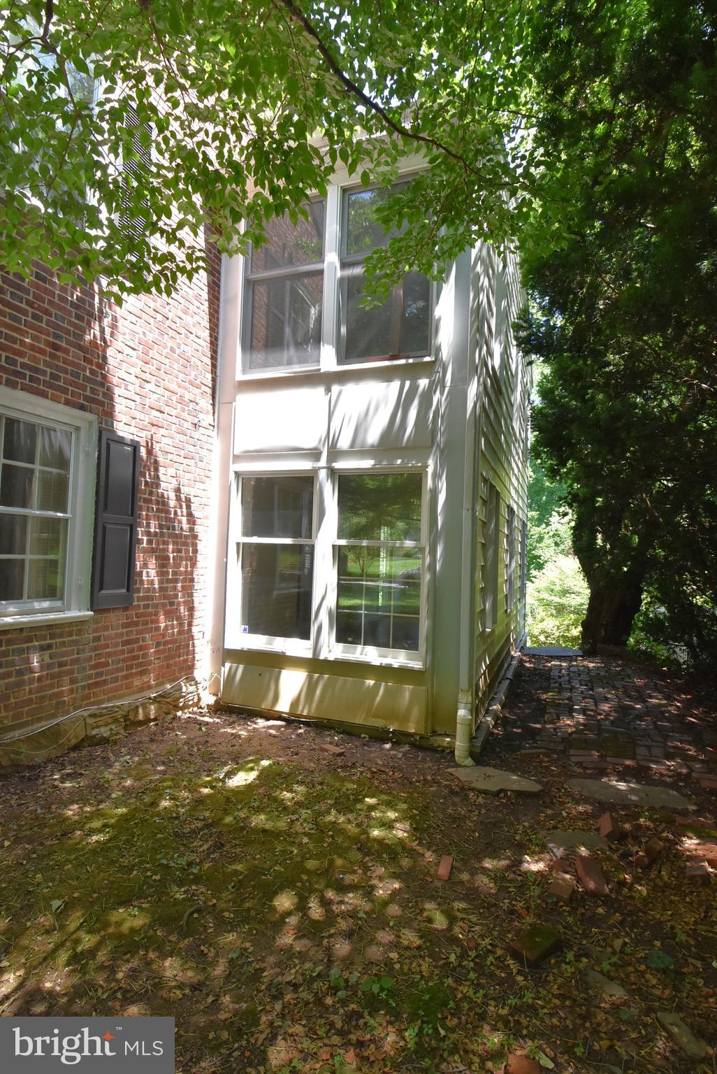 19 Farm Road Wayne, PA 19087 - Photo 40 of 41 a front view of a house with a yard
