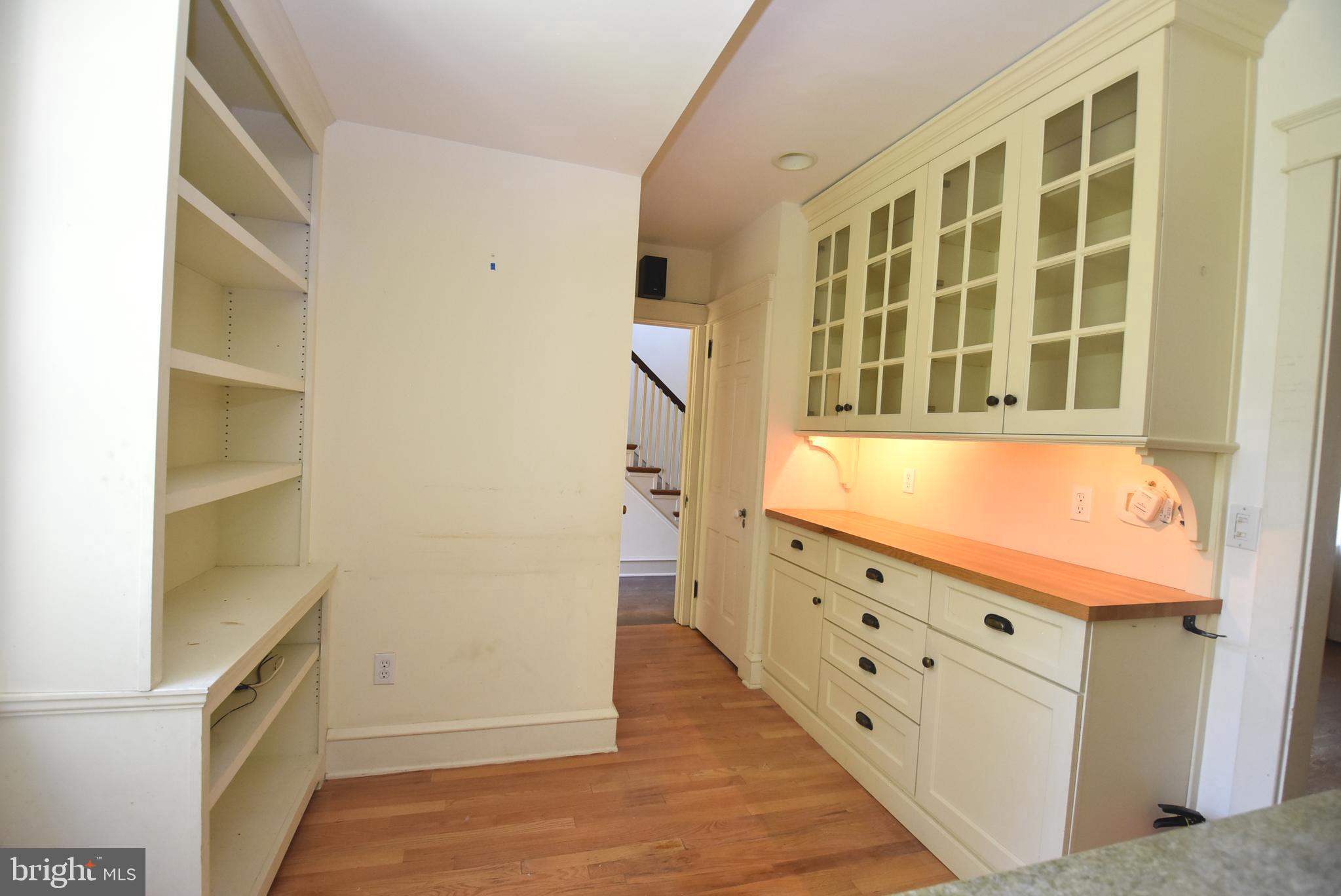 19 Farm Road Wayne, PA 19087 - Photo 6 of 41 a view of an entryway with wooden floor and cabinet
