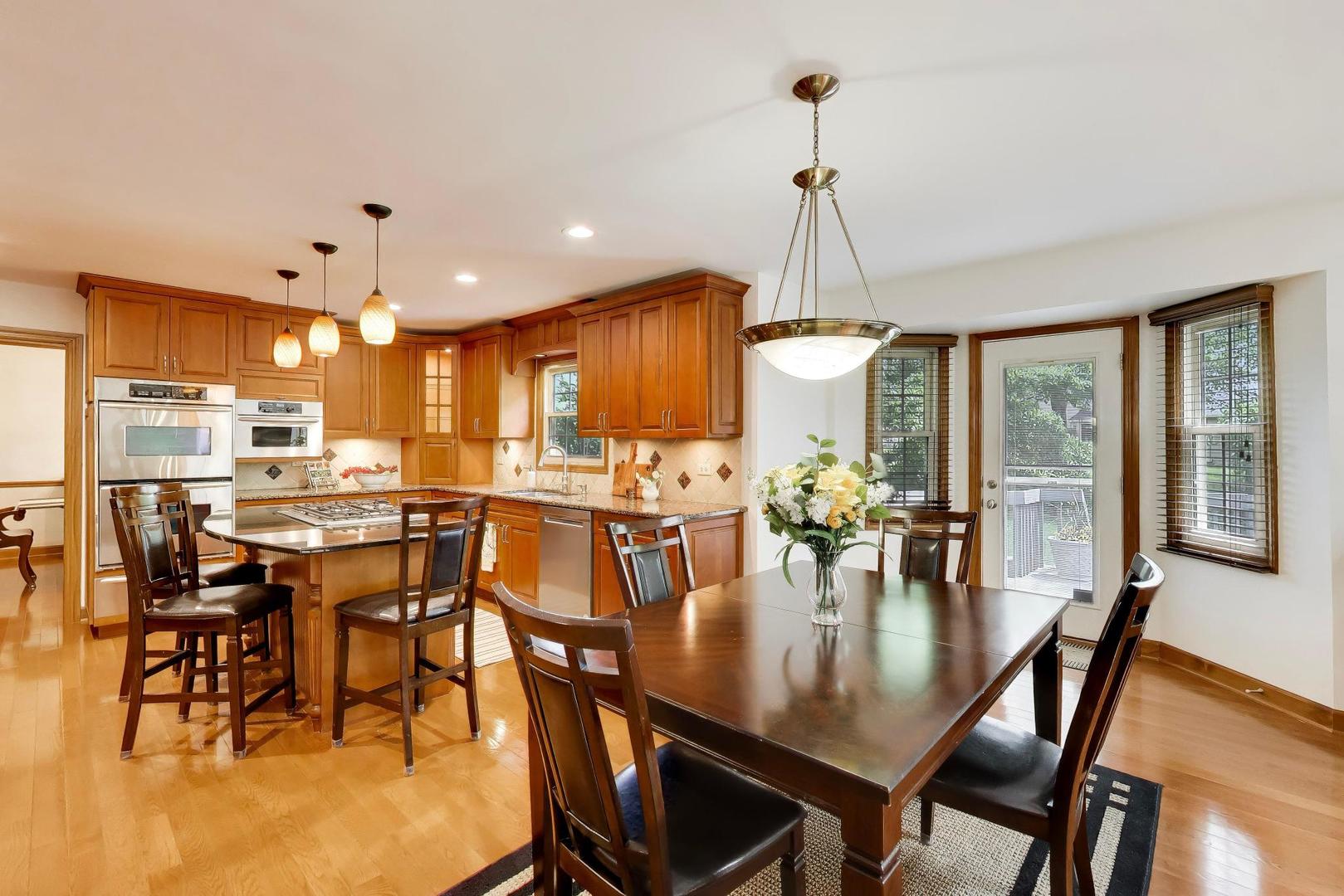 1528 Sequoia Road Naperville, IL 60540 - Photo 11 of 34 a dining room with furniture window and outdoor space