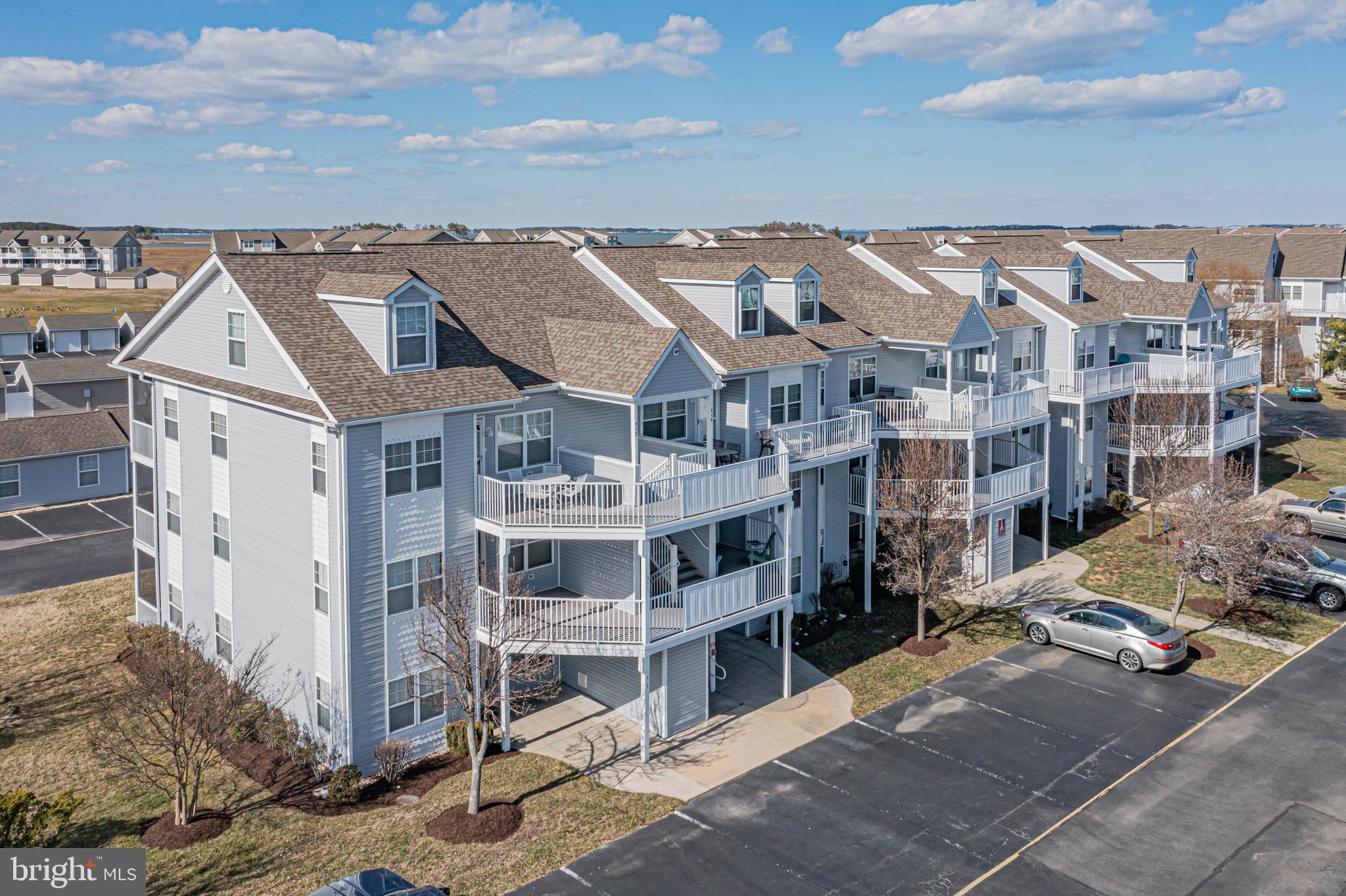 30381 Crowley Drive, Unit 313 Ocean View, DE 19970 - Photo 30 of 47 a view of city with tall buildings