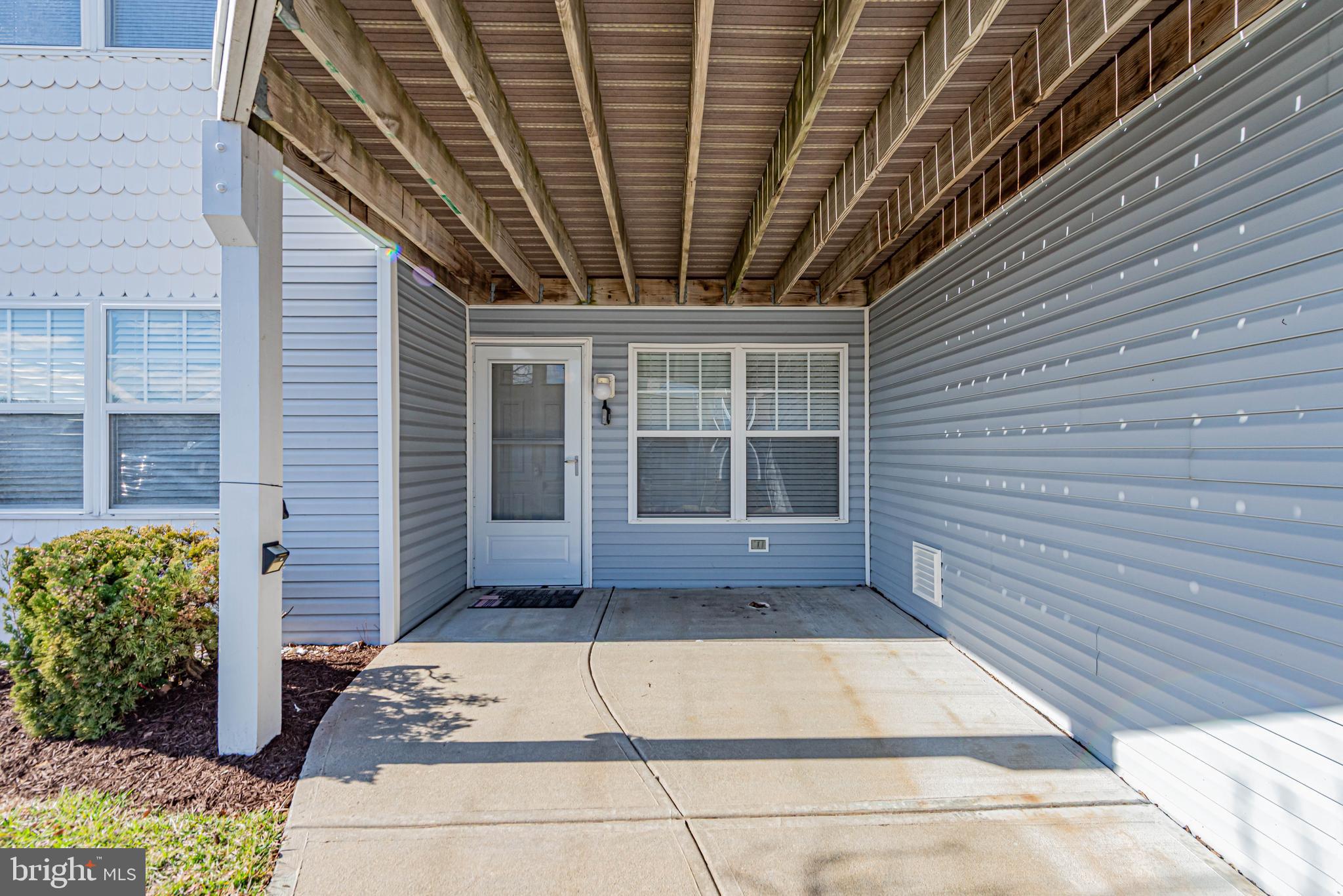 30381 Crowley Drive, Unit 313 Ocean View, DE 19970 - Photo 36 of 47 a view of entrance door of the house