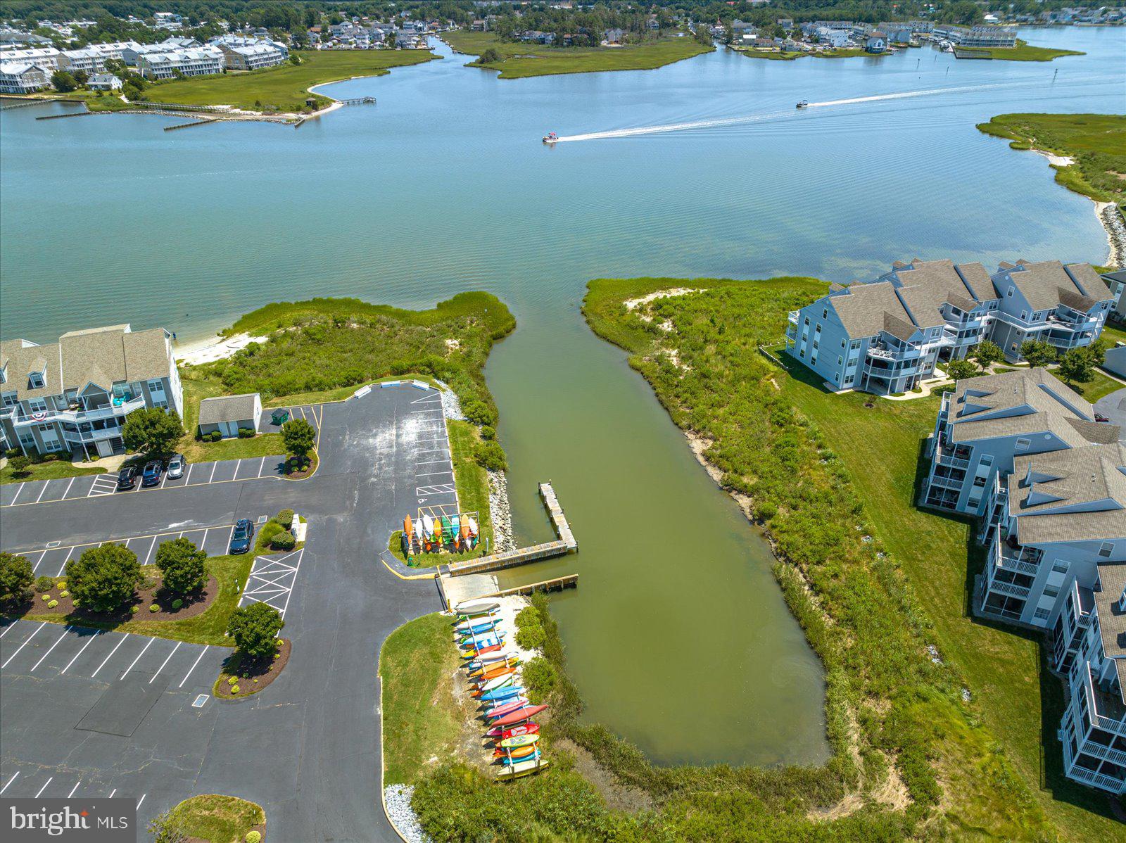 30381 Crowley Drive, Unit 313 Ocean View, DE 19970 - Photo 46 of 47 an aerial view of a house with yard swimming pool and outdoor seating