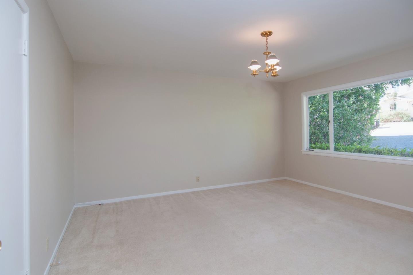 480 Darrell Road Hillsborough, CA 94010 - Photo 15 of 24 an empty room with a window