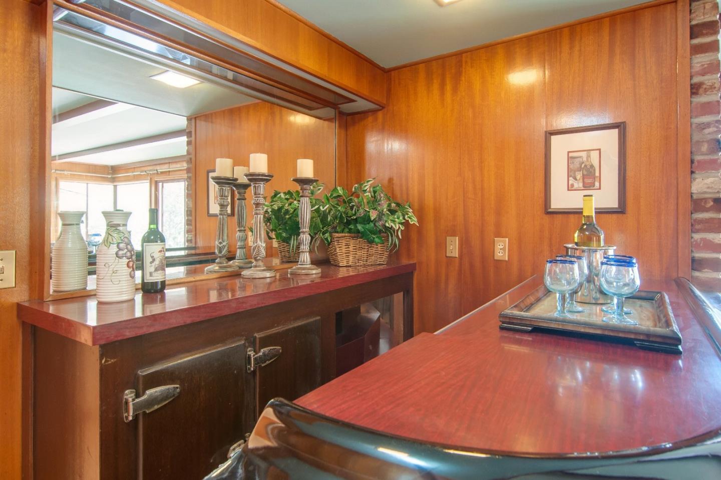 480 Darrell Road Hillsborough, CA 94010 - Photo 10 of 24 a room with a large window and dining table