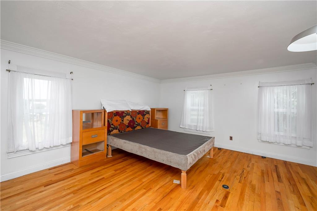 438 Main Street Prospect, PA 16052 - Photo 24 of 46 a bedroom with a bed and window
