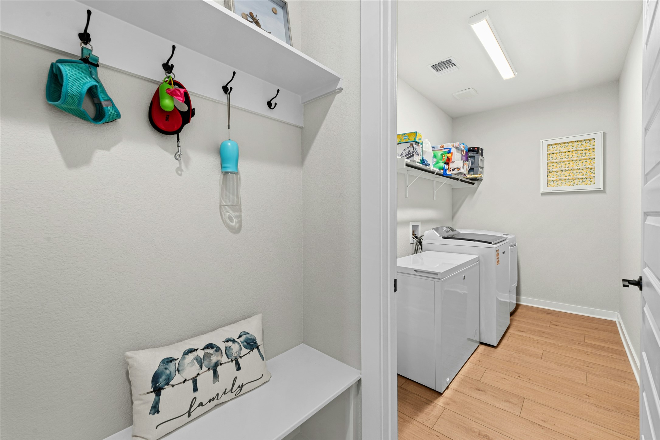 16213 Smithers Road Manor, TX 78653 - Photo 18 of 37 Laundry area with connected mud area conveniently located through the master closet.