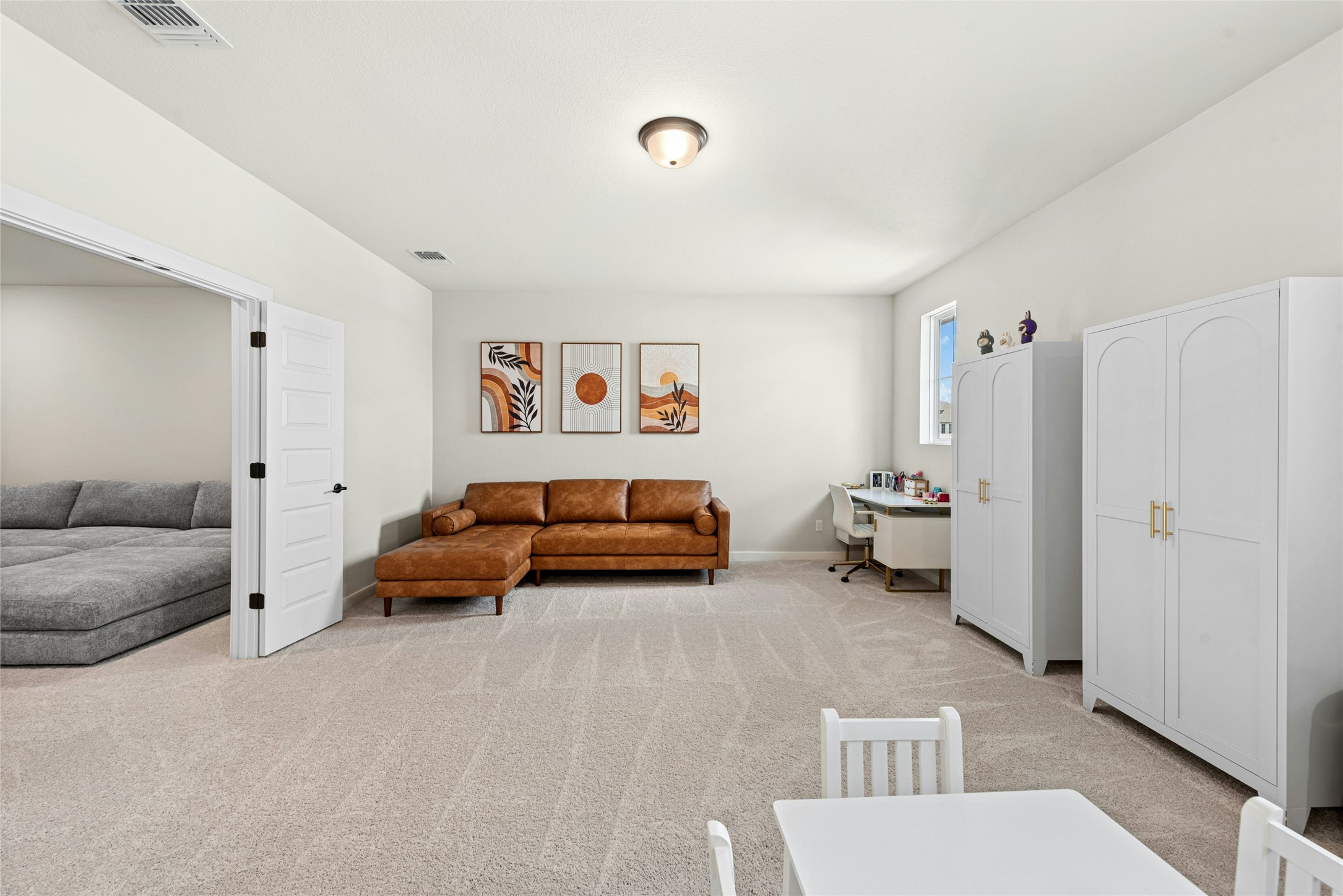 16213 Smithers Road Manor, TX 78653 - Photo 20 of 37 Living room with light carpet and an office area