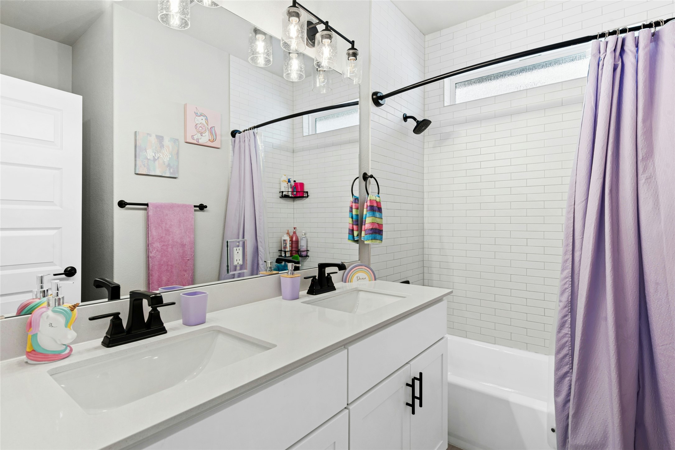 16213 Smithers Road Manor, TX 78653 - Photo 33 of 37 Full bathroom featuring double vanity and shower / tub combo
