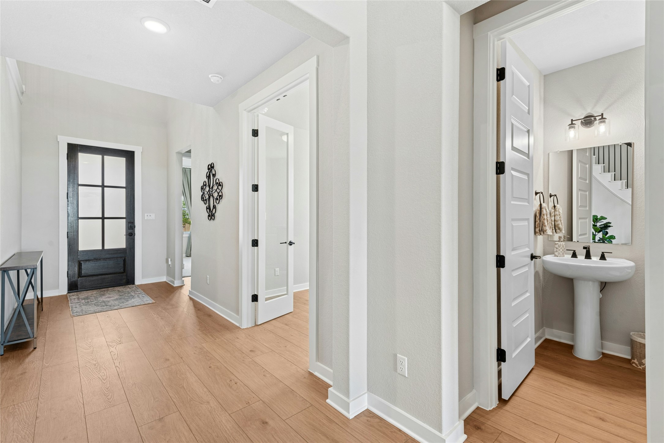 16213 Smithers Road Manor, TX 78653 - Photo 4 of 37 Foyer entrance featuring light wood-style floors