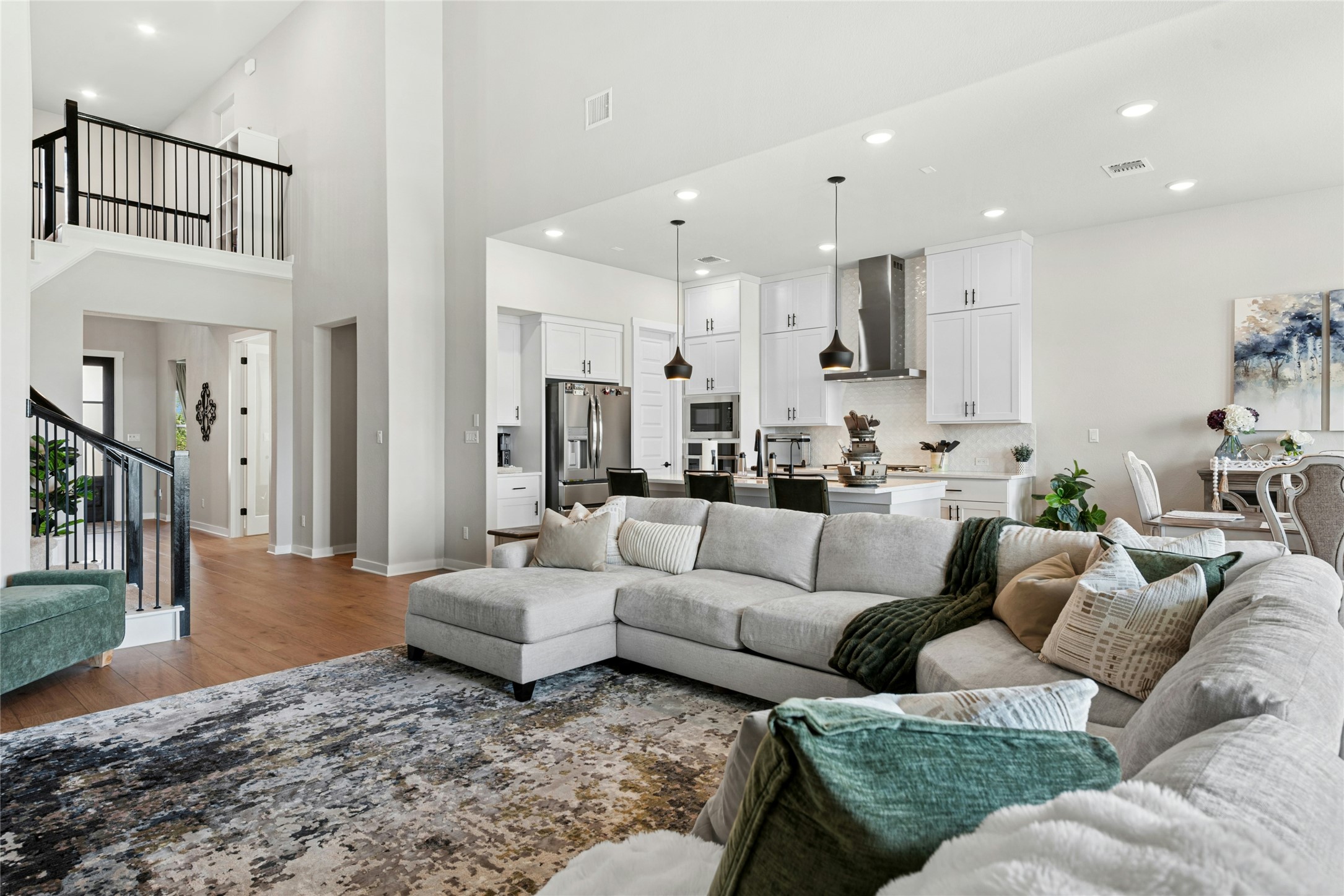 16213 Smithers Road Manor, TX 78653 - Photo 10 of 37 Open Living area with plenty of natural light, a high ceiling, and recessed lighting