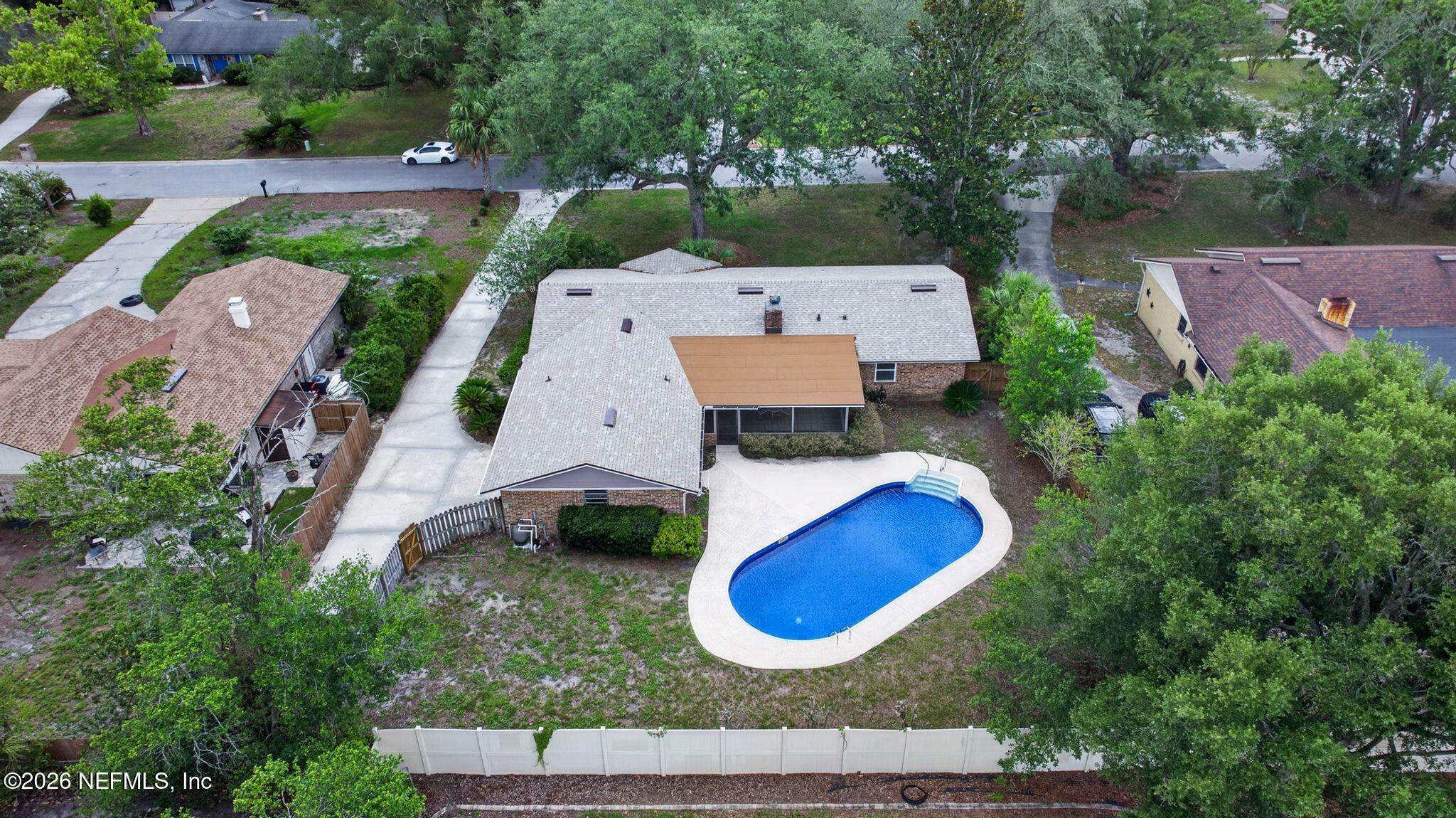 138 Ridgefield Court Orange Park, FL 32065 - Photo 3 of 64 an aerial view of a house with swimming pool