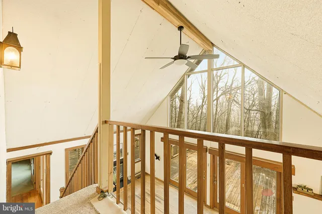 a view of a garage with wooden floor