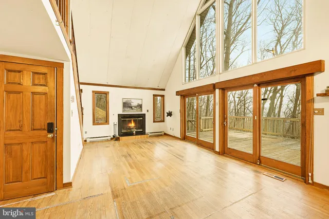 a view of an entryway with a floor to ceiling window