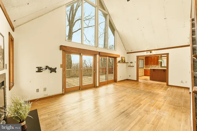 a view of an entryway with wooden floor