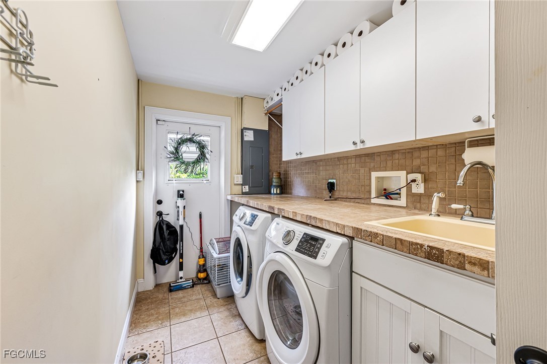 6519 East Town And River Road Fort Myers, FL 33919 - Photo 28 of 36 a utility room with sink dryer and washer