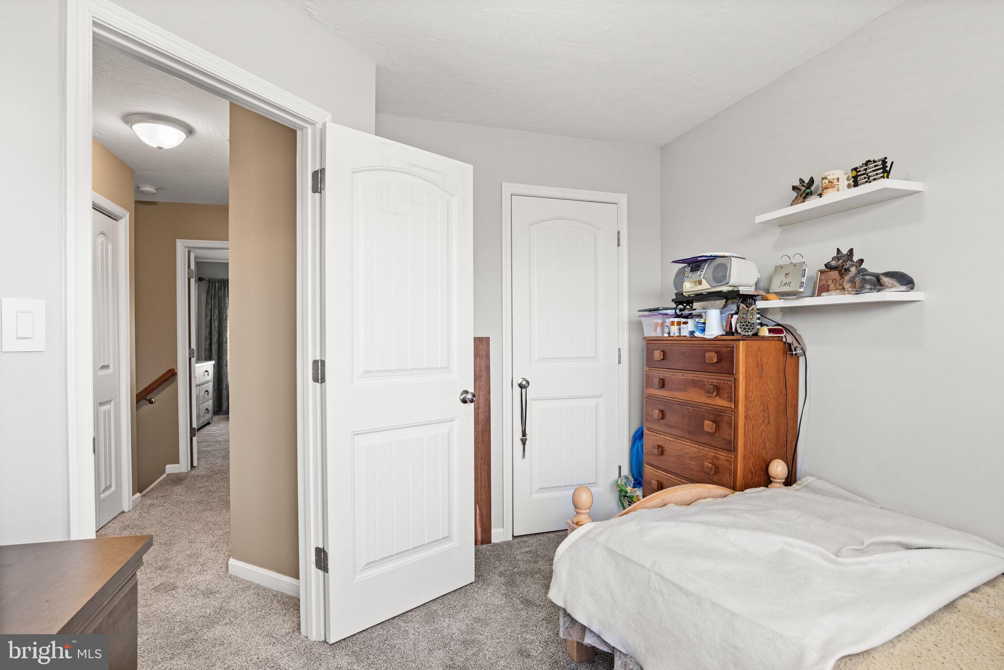 144 Overlook Dr. Hanover, PA 17331 - Photo 22 of 35 a bedroom with a bed and a closet