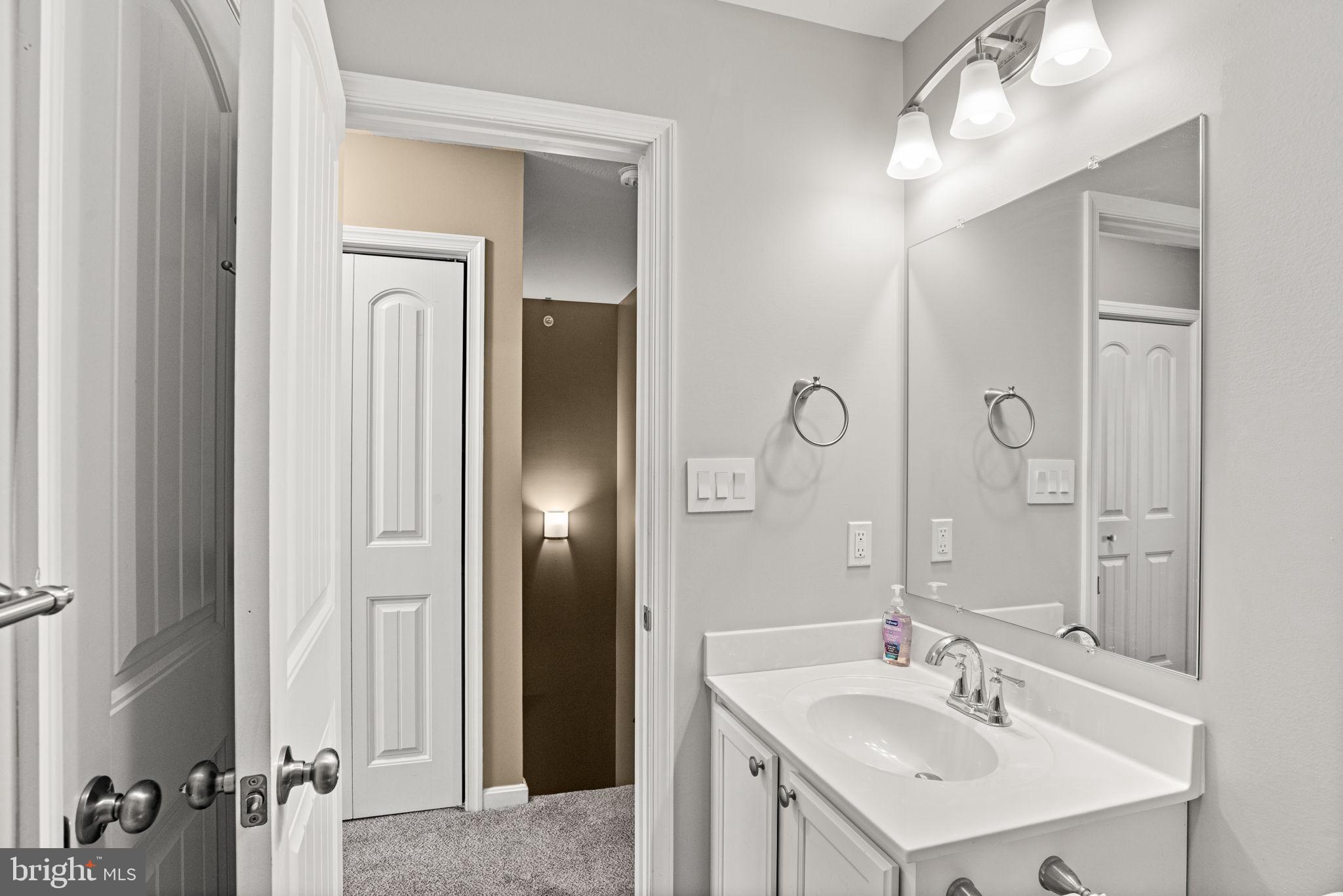144 Overlook Dr. Hanover, PA 17331 - Photo 25 of 35 a bathroom with a sink vanity and a mirror