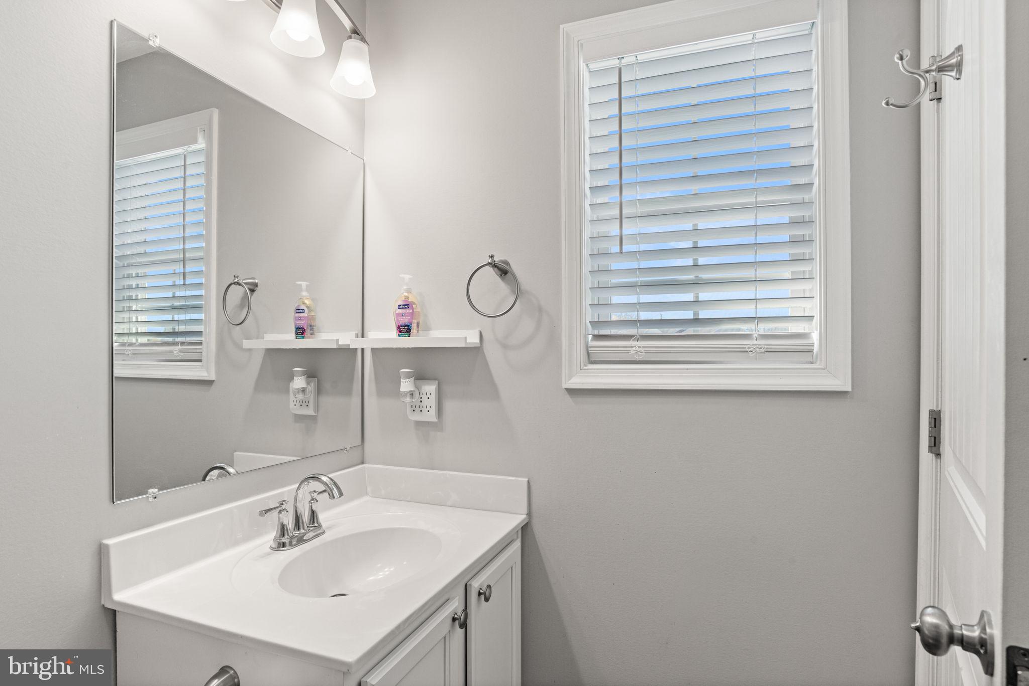 144 Overlook Dr. Hanover, PA 17331 - Photo 27 of 35 a bathroom with a sink and a mirror