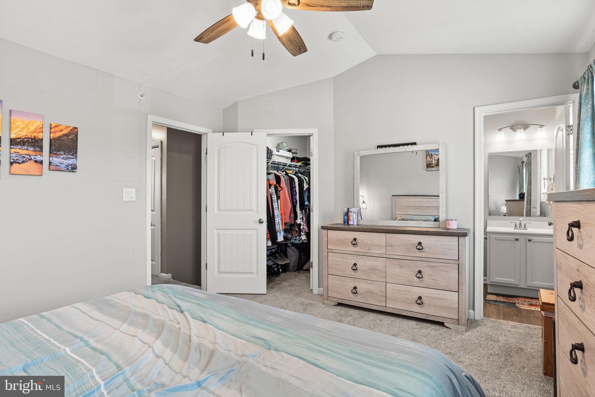 144 Overlook Dr. Hanover, PA 17331 - Photo 28 of 35 a bedroom with a bed and a dresser