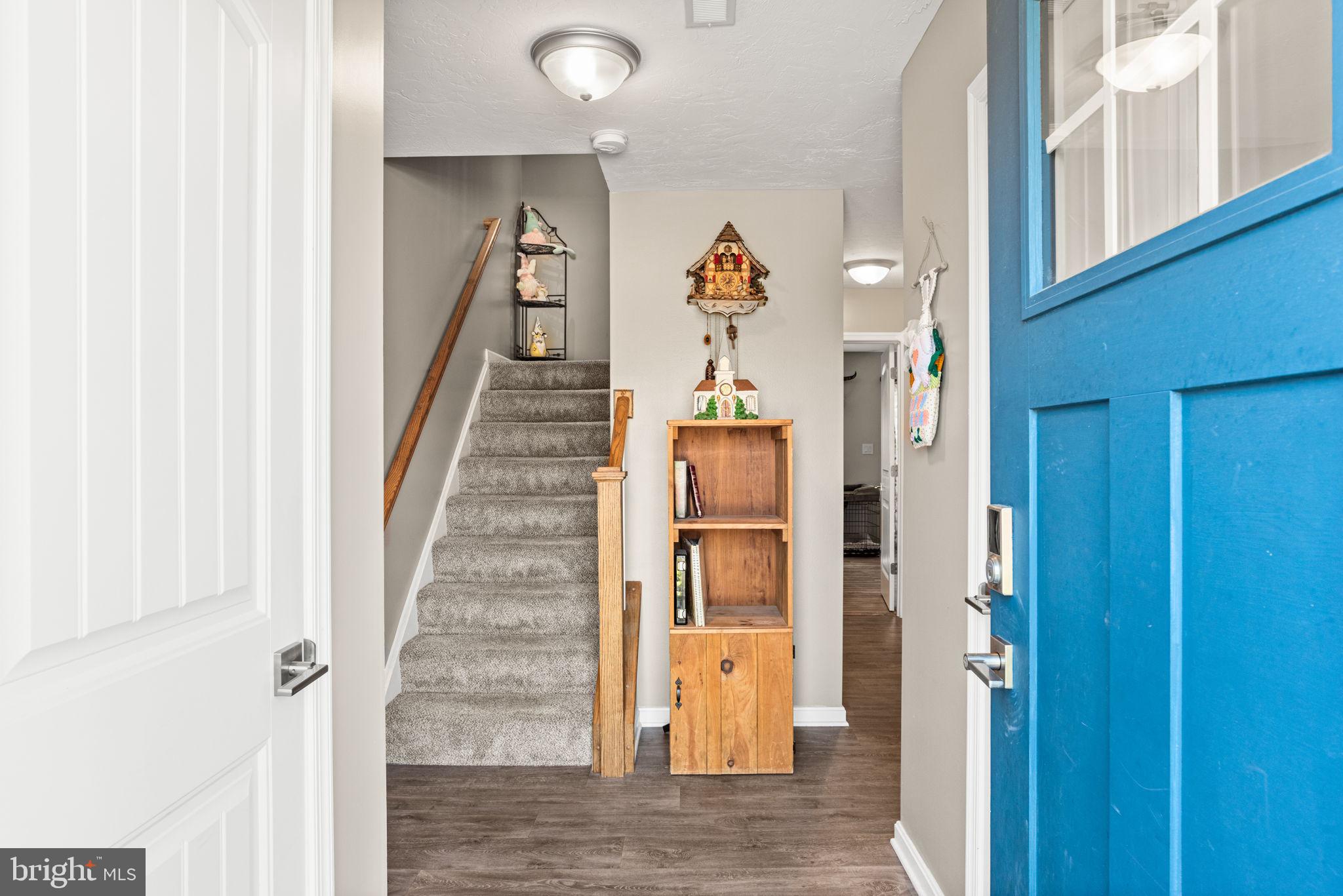 144 Overlook Dr. Hanover, PA 17331 - Photo 5 of 35 a view of a hallway with wooden floor and entryway